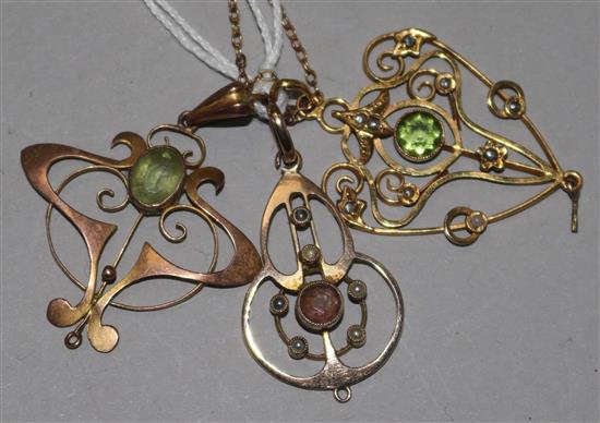 Three Art Nouveau 9ct gold and gem set pendants, one with 9ct gold chain, largest 36mm.